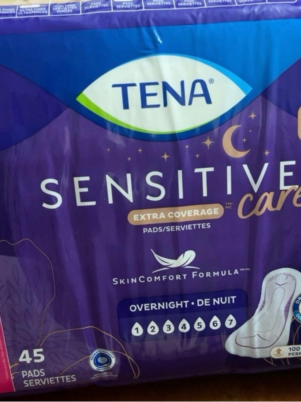 TENA Sensitive Care Overnight Pads - Purple